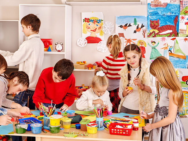 children enjoying their art projects