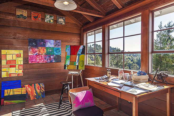 rustic artist studio with art furniture and paintings