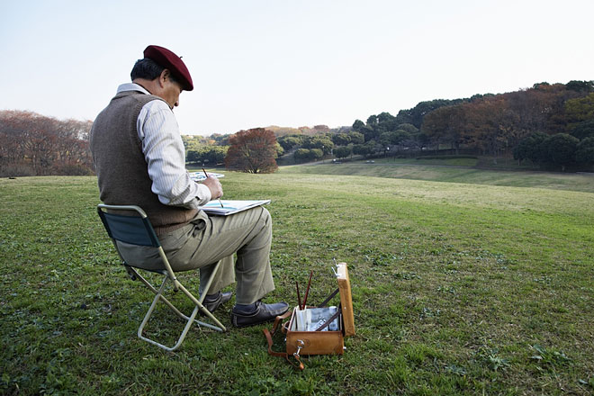 plein air artist with tote box